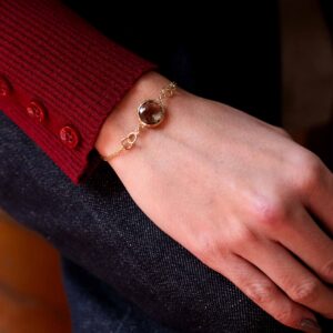 Alternative view of Pulseira ara fumé dourada