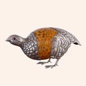 Partridge with coral egg in fossil