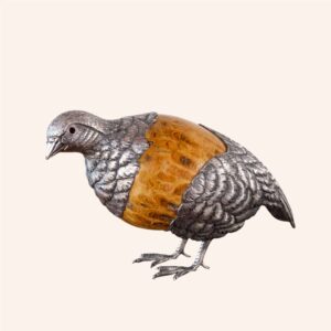 Partridge with coral egg in fossil