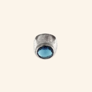 Ring with blue stone